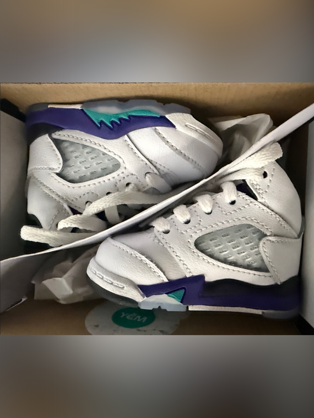 Jordan Kids White Sneakers with Purple and Teal Accents